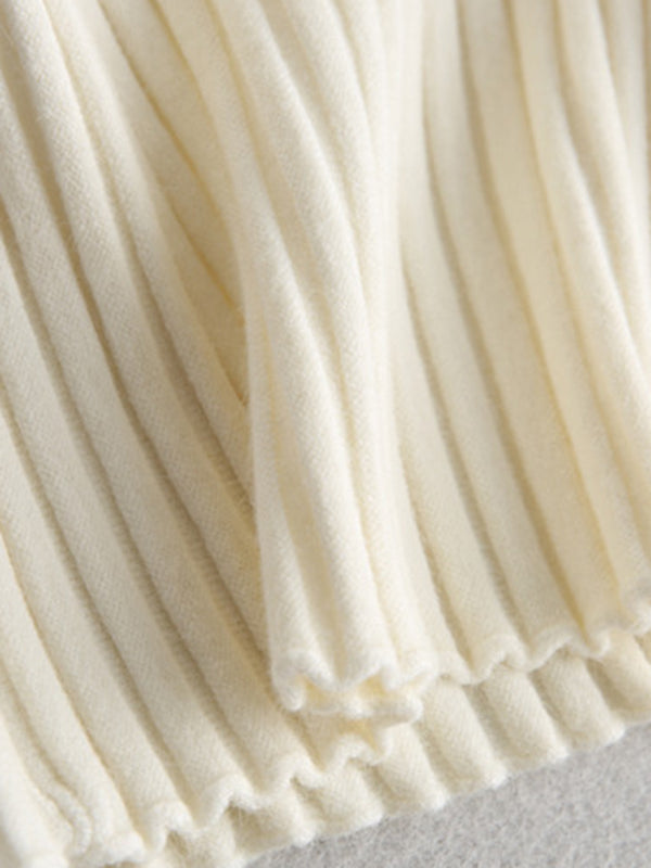 Pull en tricot à manches courtes et col bateau de couleur unie