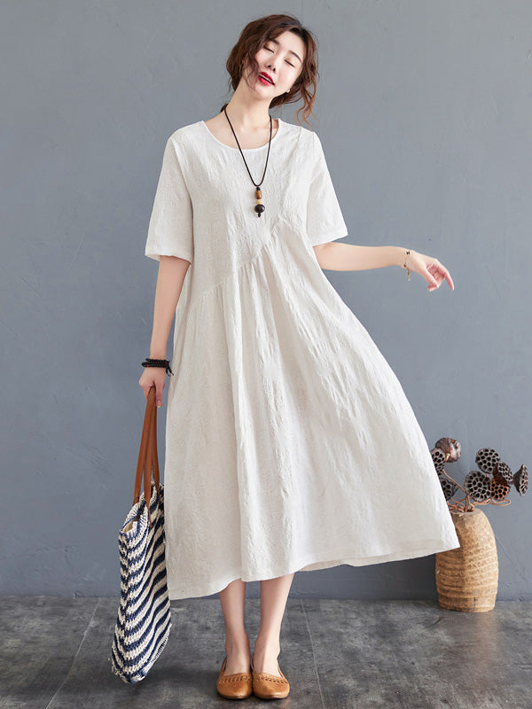 Robe irrégulière de couleur unie en mélange de coton