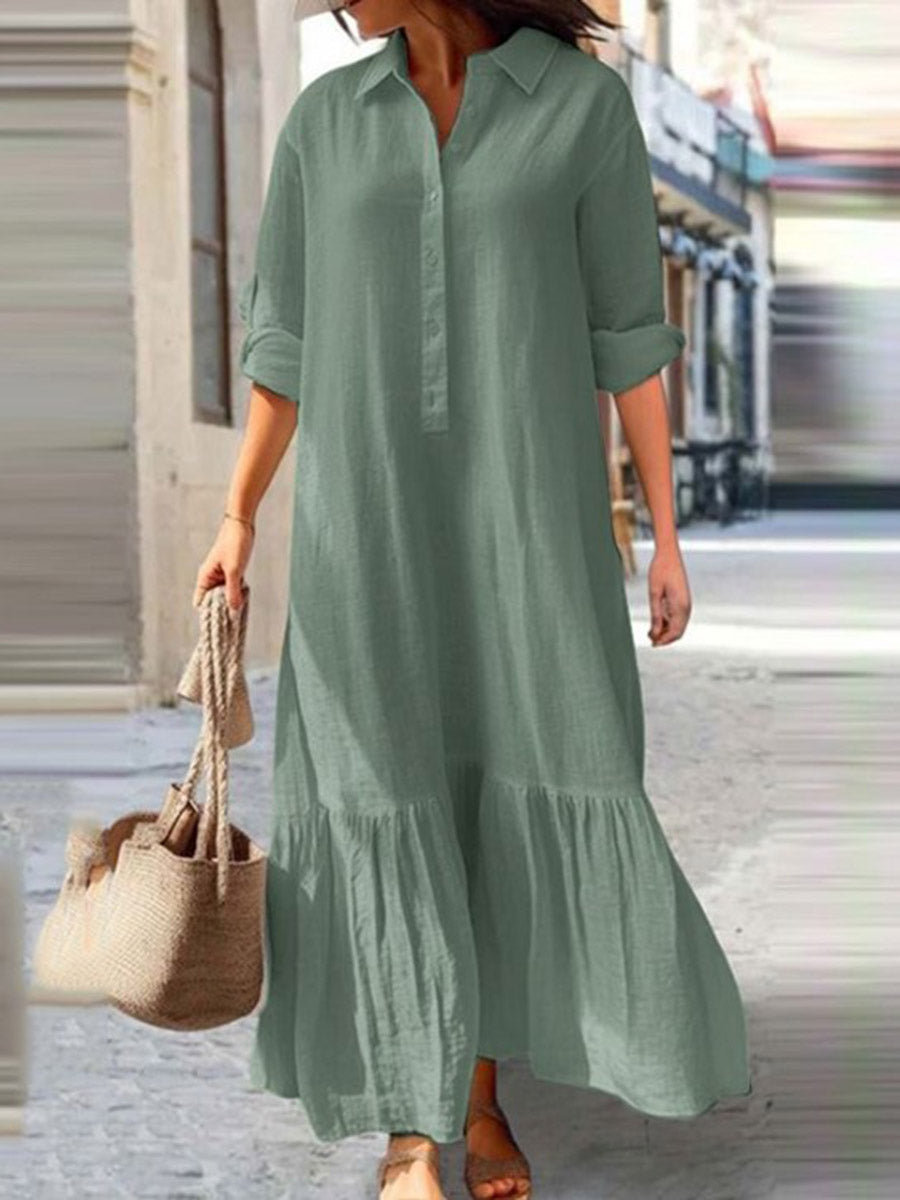 Robe longue boutonnée plissée coupe trapèze, à manches longues, à empiècements, à col revers, couleur unie
