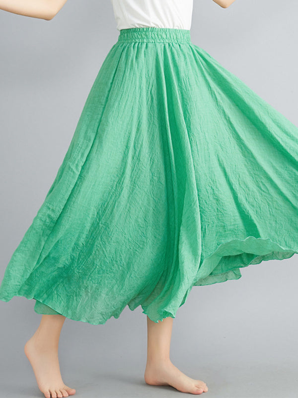 Jupe ample plissée coupe trapèze, à taille élastique, couleur unie