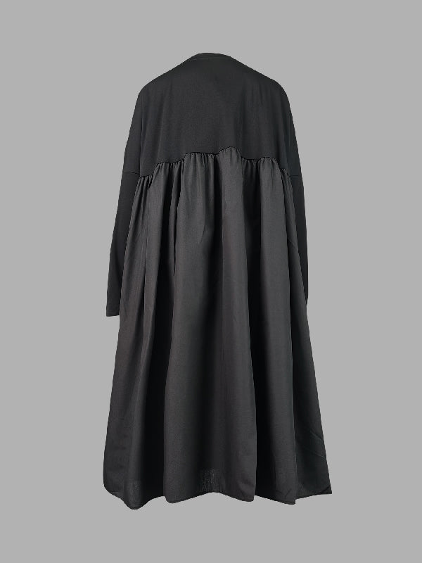 Robe mi-longue simple ample noire à empiècements, à manches longues