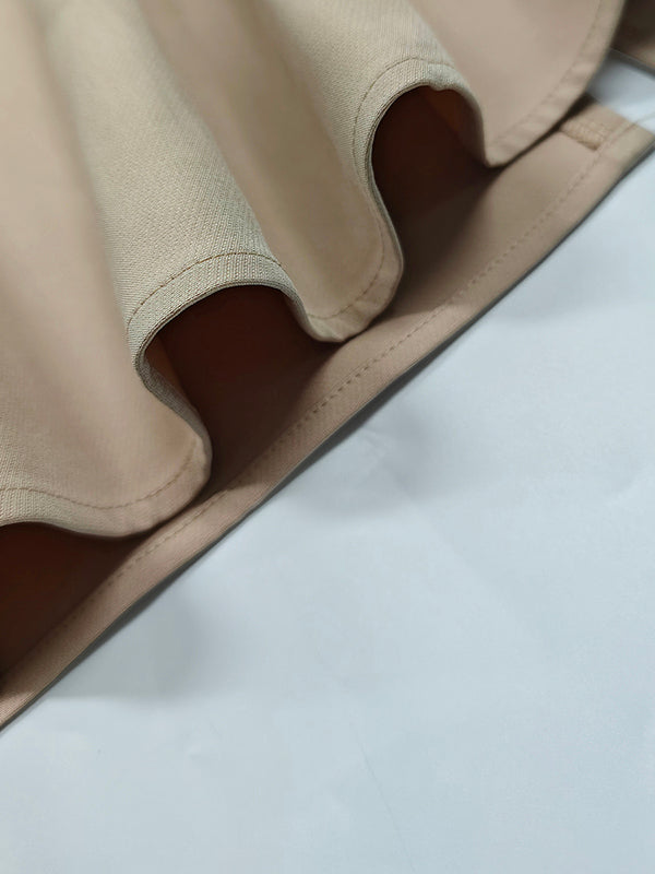 Robe mi-longue ample plissée taille haute, à col rond, couleur unie