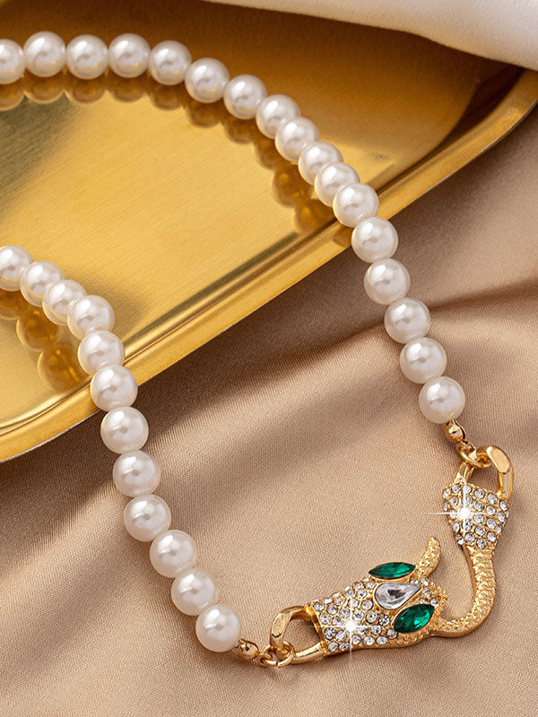Collier perlé délicat en forme de serpent
