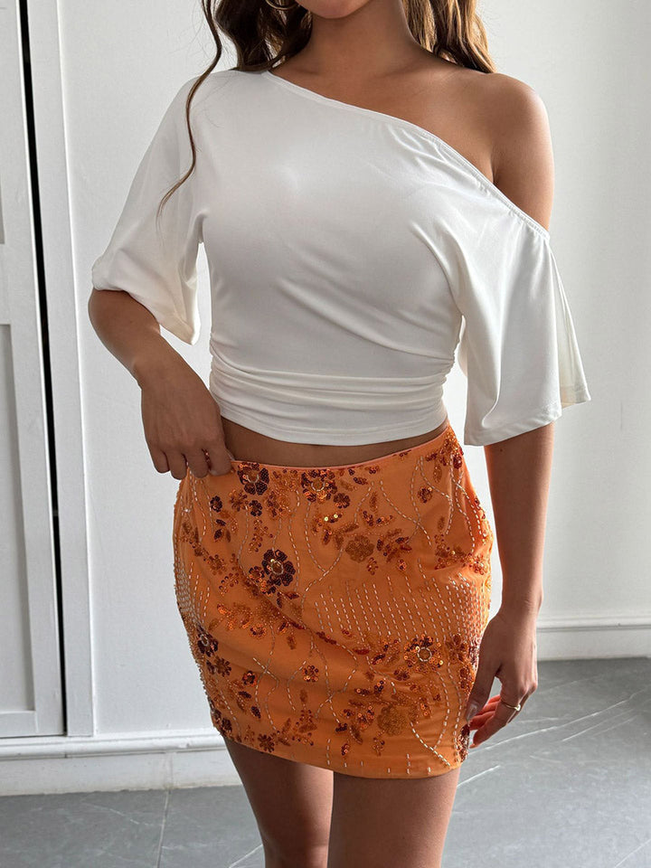 T-shirt à manches courtes, asymétrique à une épaule, couleur unie