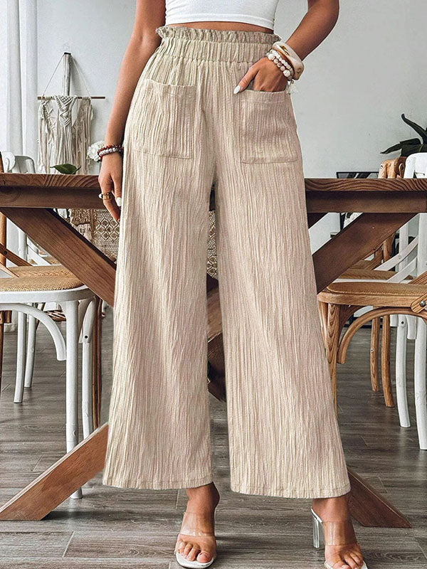 Pantalon ample plissé à jambes larges, à taille élastique, à poches, à empiècements, couleur unie
