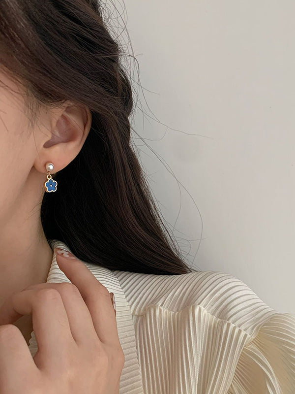 Accessoires de boucles d'oreilles en forme de fleur à géométrie vintage