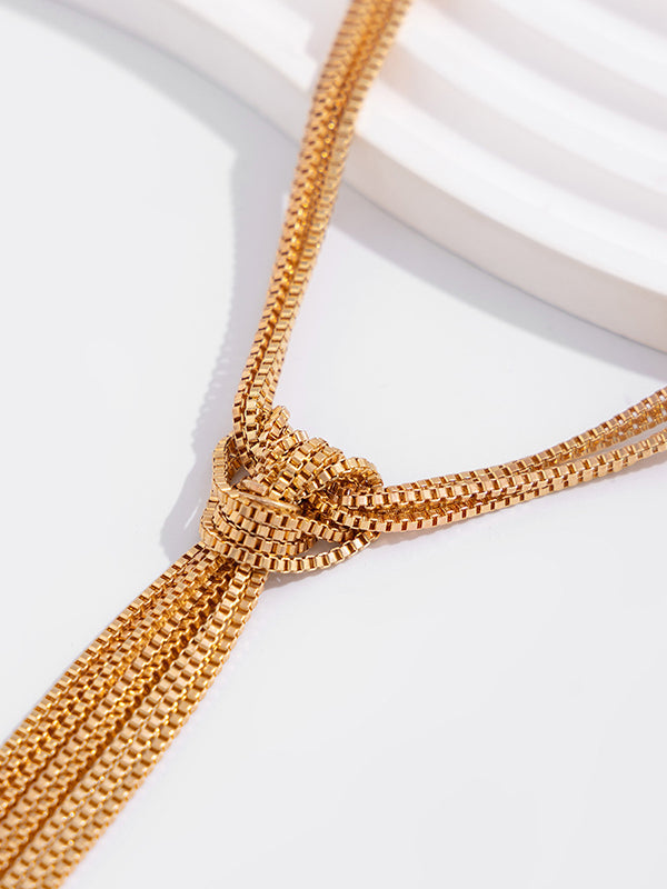 Collier à pompons