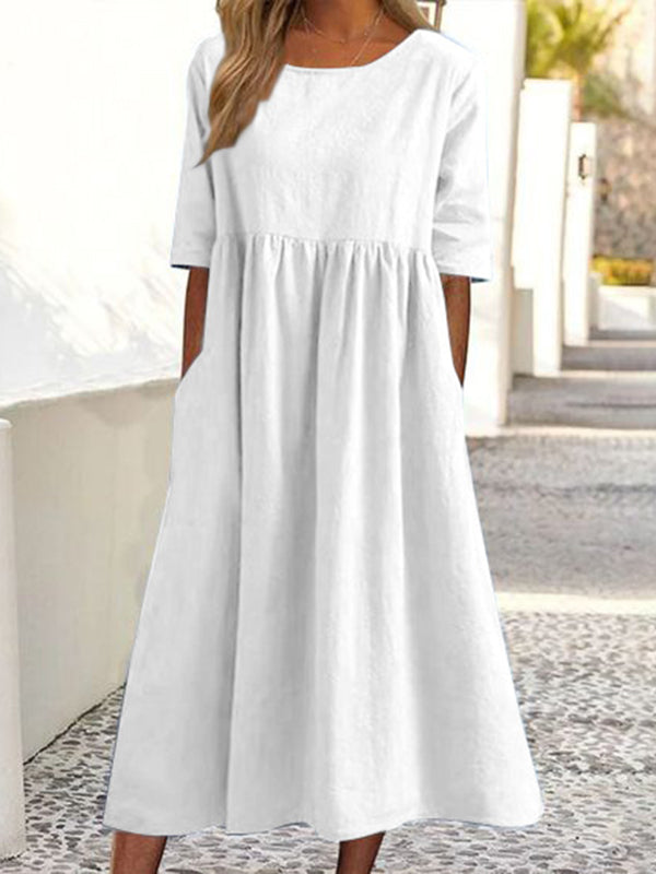 Robe mi-longue plissée coupe trapèze, à manches mi-longues, à poches, à col rond, couleur unie