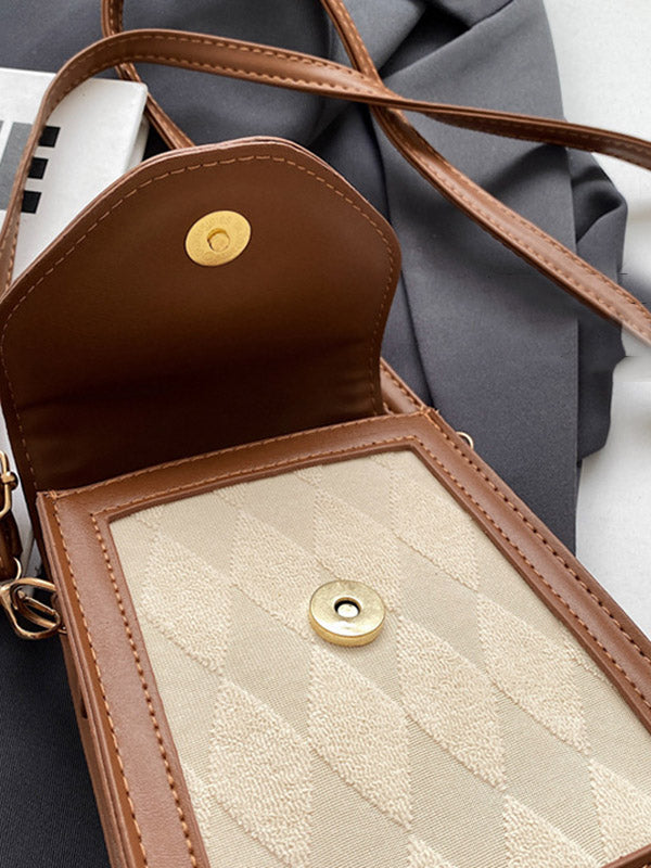 Sac bandoulière géométrique à empiècements