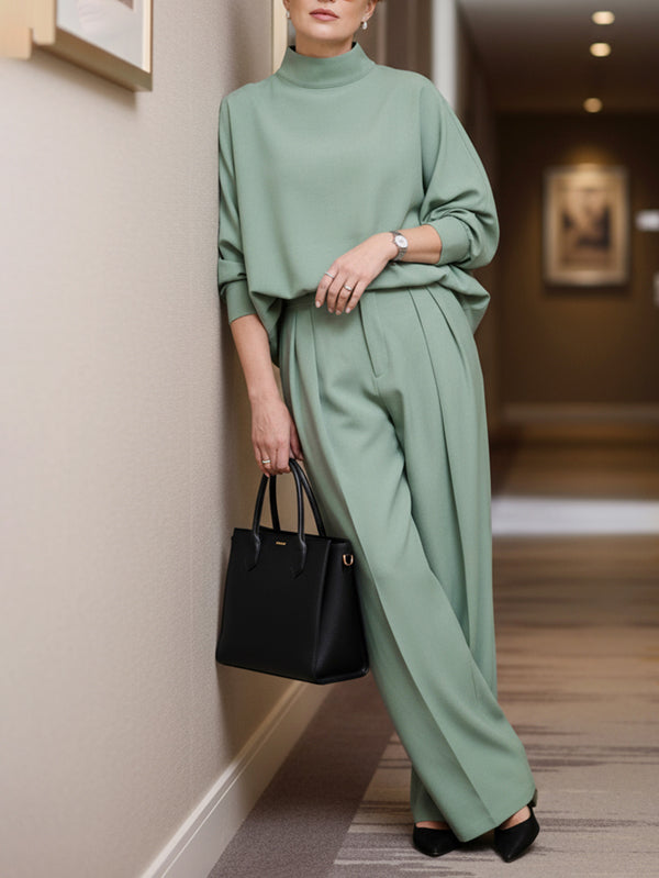 Pantalon ample boutonné plissé couleur unie
