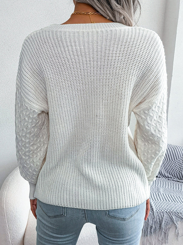 Pull ample à manches longues en tricot torsadé de couleur unie à col rond