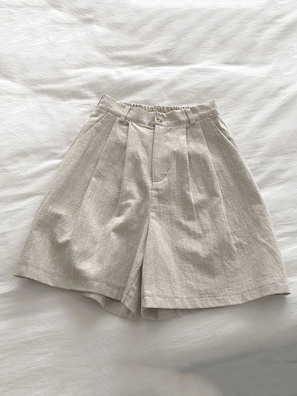 Short ample plissé à jambes larges, à taille élastique, couleur unie