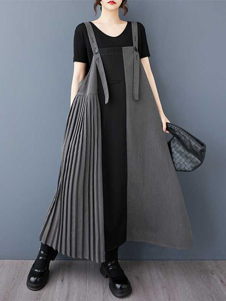 Robe mi-longue ample asymétrique boutonnée plissée coupe trapèze, à poches, à empiècements, à bretelles réglables, couleur contrastée