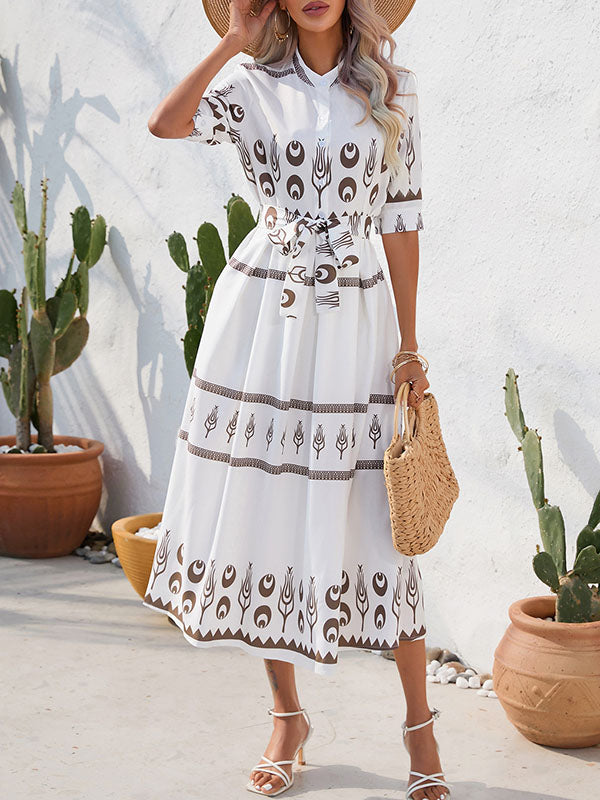 Robe mi-longue boutonnée coupe trapèze, à manches mi-longues, à taille nouée, à col revers