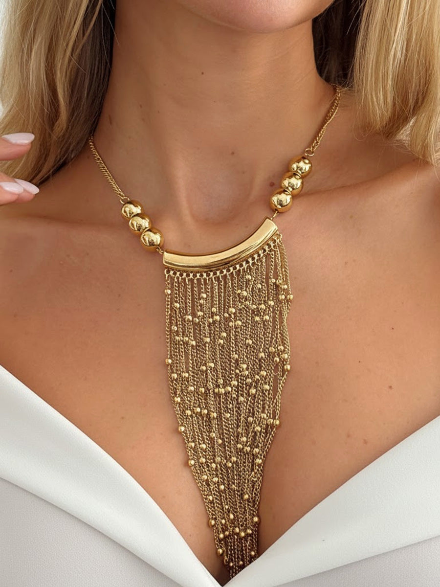 Collier géométrique à pompons