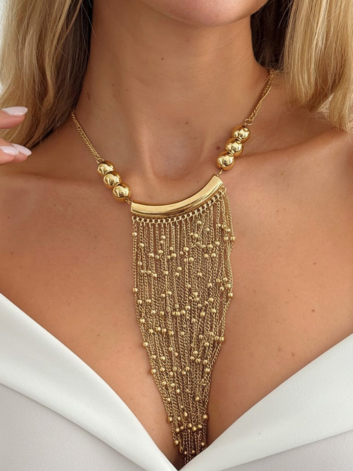Collier géométrique à pompons