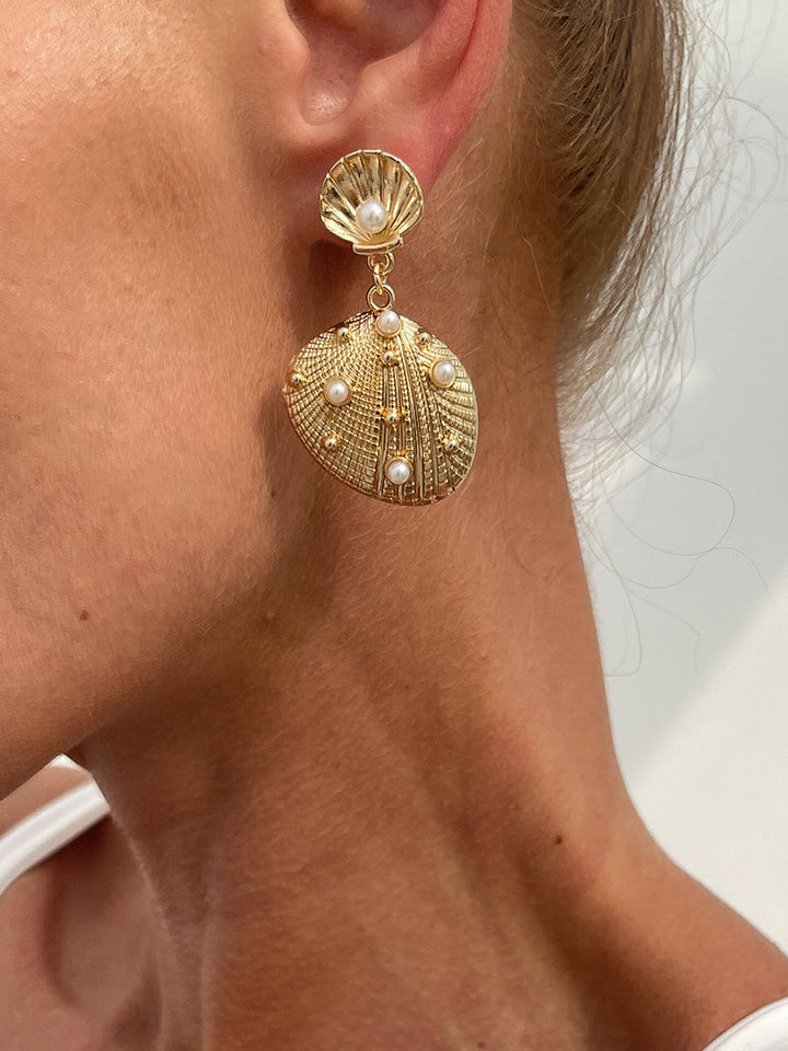 Boucles d'oreilles en forme de coquillage