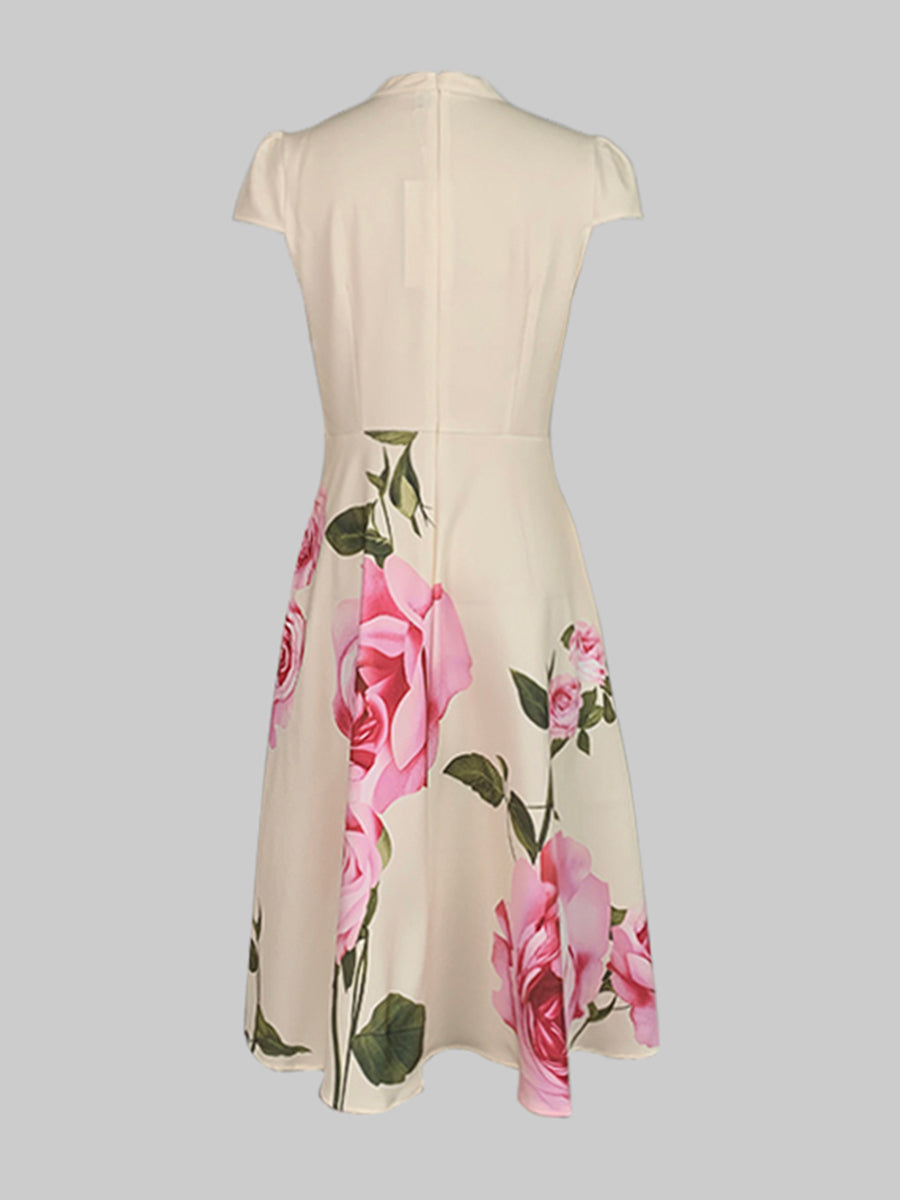 Robe mi-longue à manches courtes, coupe près du corps, à imprimé floral, à col montant