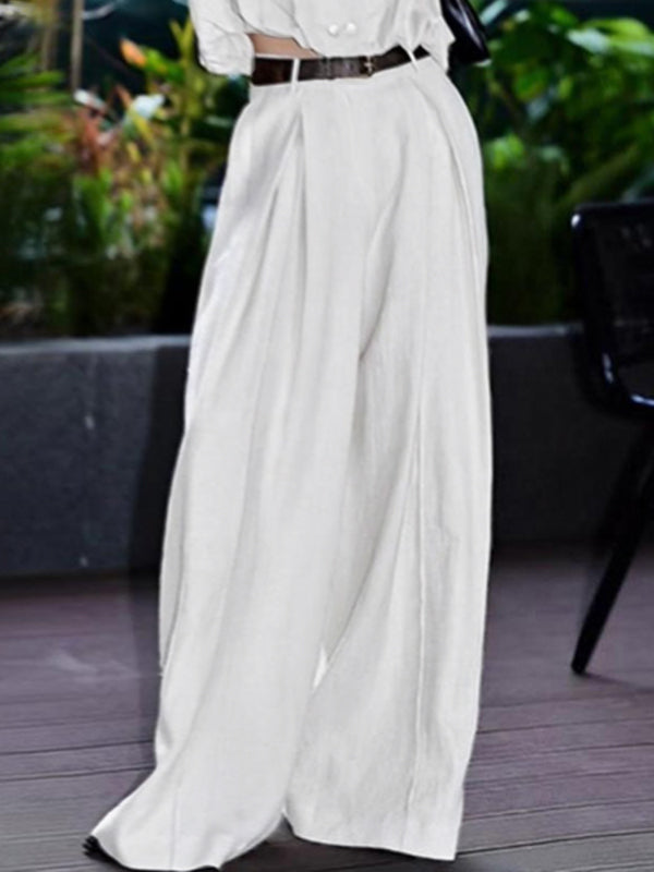 Pantalon de tailleur ample plissé taille haute, à empiècements, couleur unie