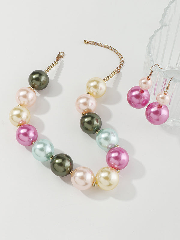 Parure boucles d'oreilles pendantes et collier géométrique couleur contrastée
