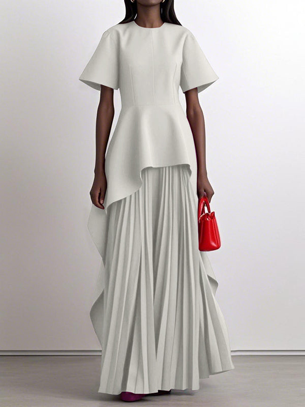 Robe longue plissée coupe trapèze, taille haute, à empiècements, à col rond, couleur unie
