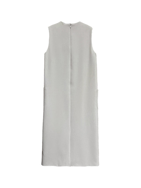 Robe mi-longue ample fendue dans le dos taille haute, à poches, à fermeture éclair, à col rond, couleur unie