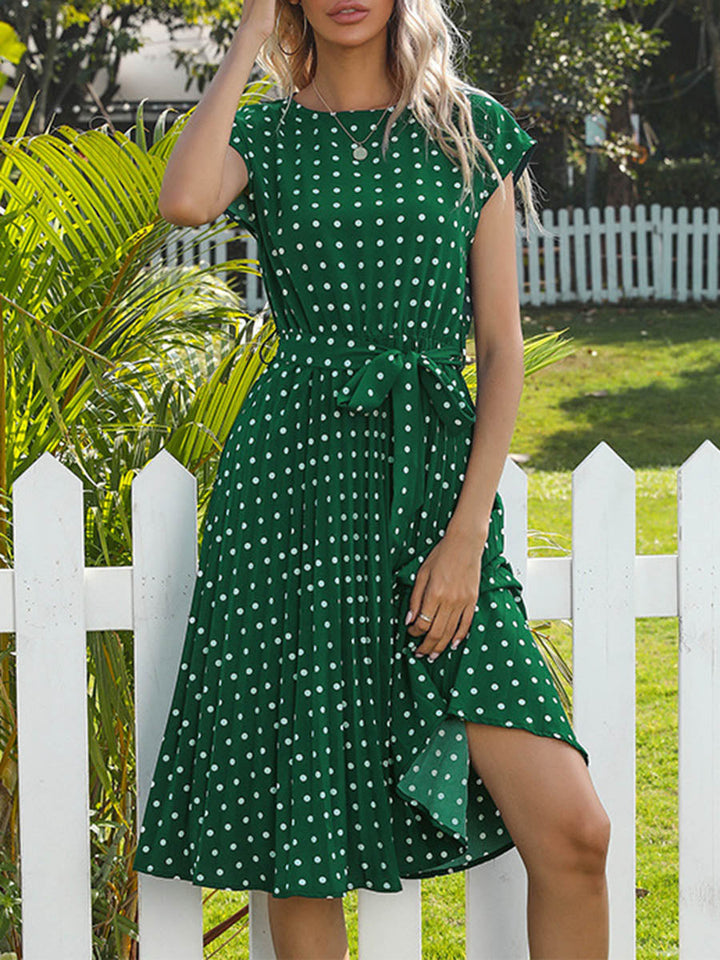 Robe mi-longue boutonnée plissée coupe trapèze, à mancherons, à pois, à empiècements, à taille nouée, à col rond, couleur contrastée