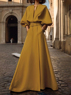 Robe longue ample à manches mi-longues, avec ceinture, à décolleté en V profond, couleur unie