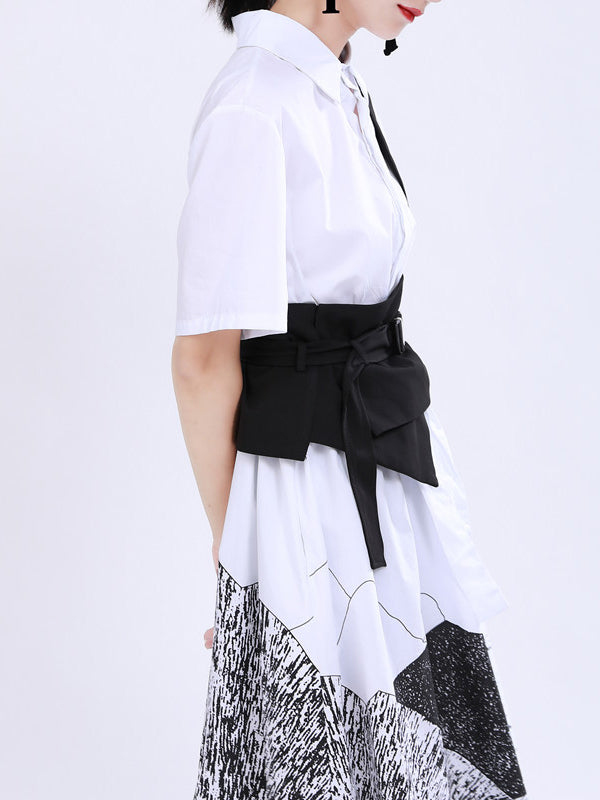 Gilet noir avec boucle de ceinture élégante