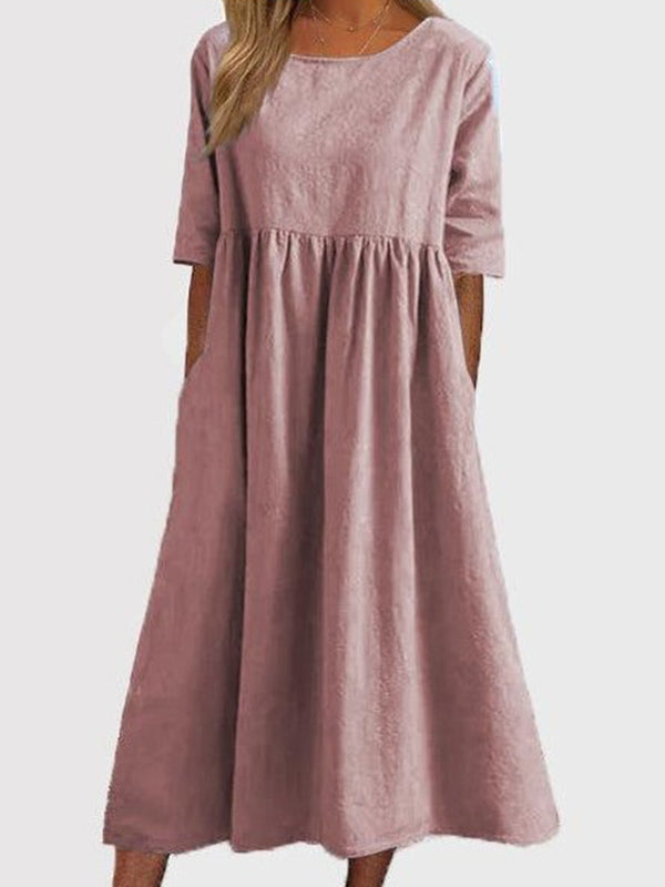 Robe mi-longue plissée coupe trapèze, à manches mi-longues, à poches, à col rond, couleur unie