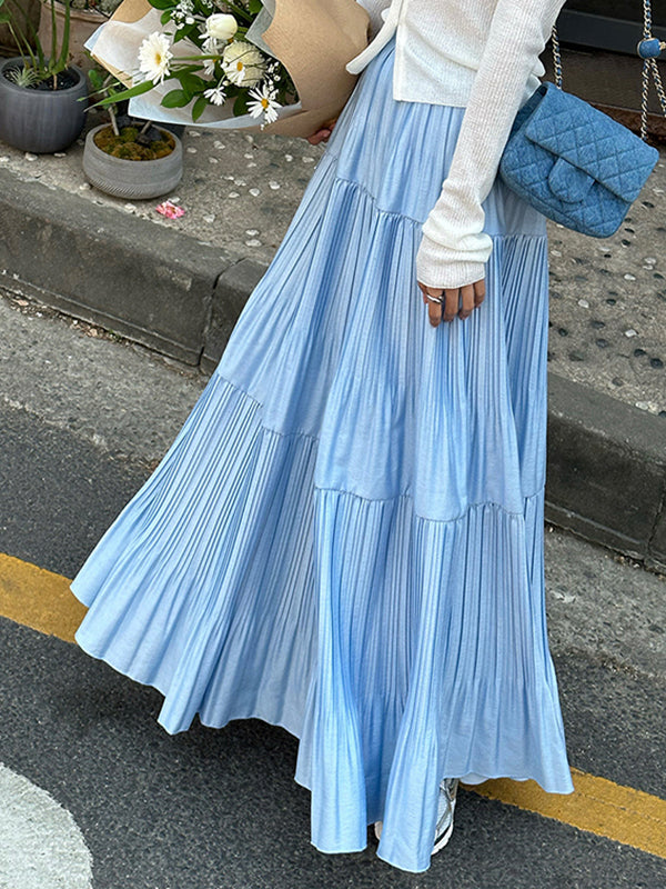 Jupe plissée coupe trapèze, taille haute, à empiècements, couleur unie