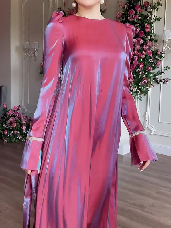 Robe longue plissée coupe trapèze, à manches longues, à taille nouée, à fermeture éclair, à col rond, couleur unie
