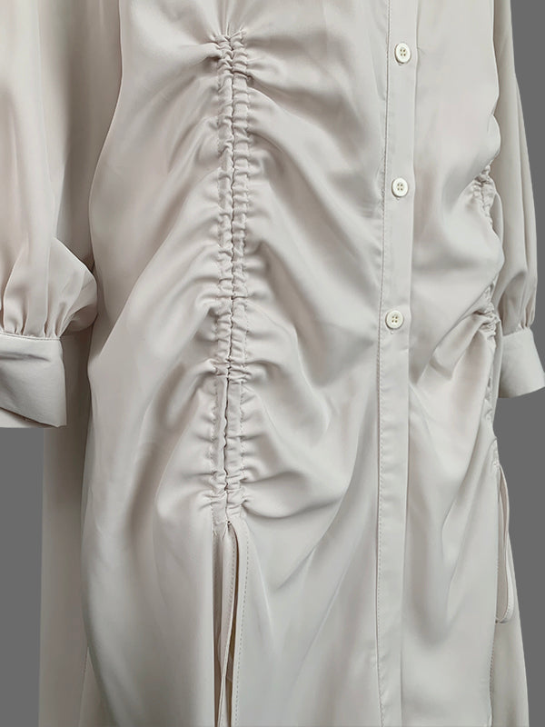 Robe mi-longue boutonnée plissée à ourlet plongeant, à manches longues, à cordon de serrage, à poches, à col revers, couleur unie