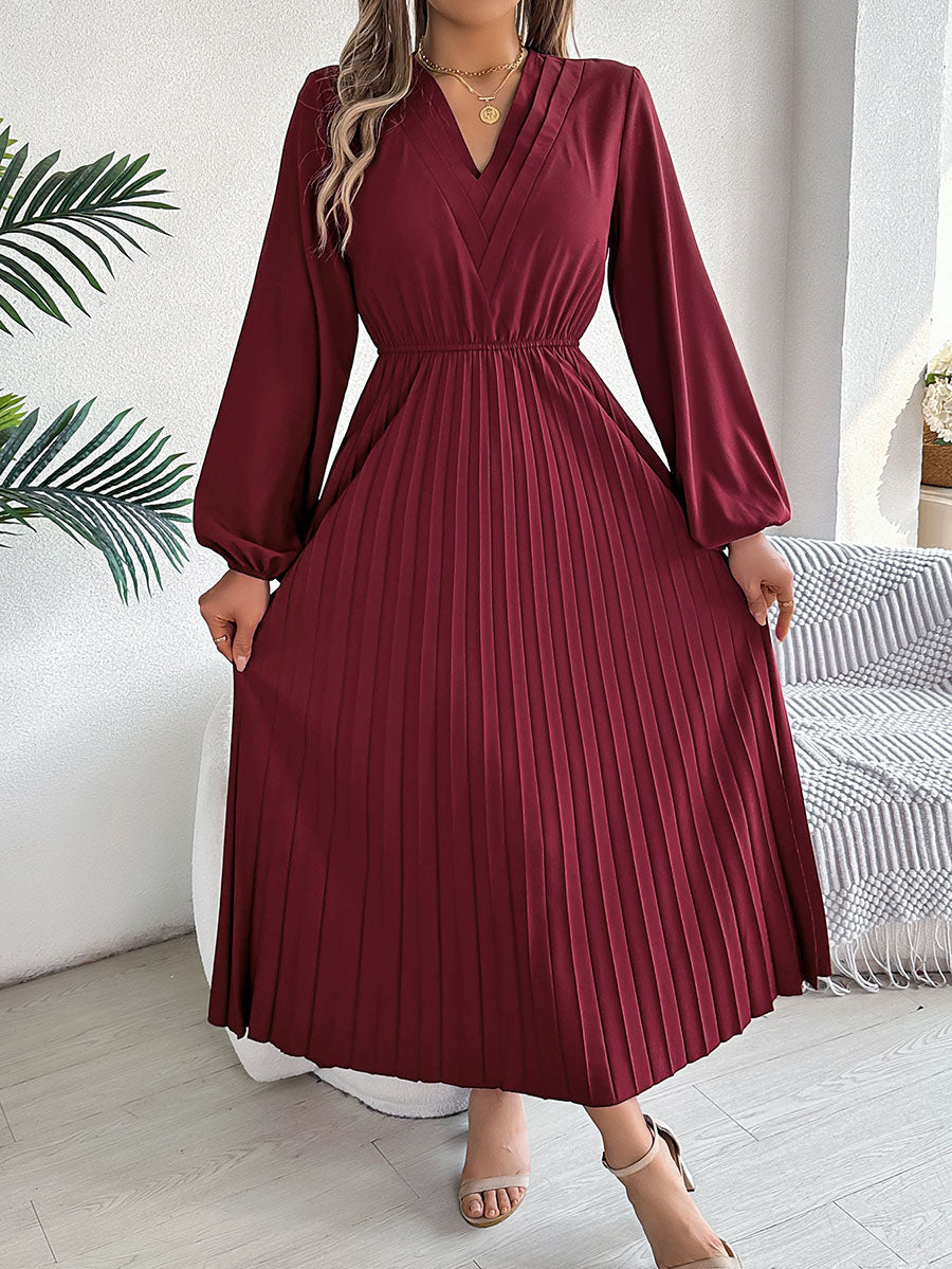 Robe longue plissée coupe trapèze, taille haute, à taille élastique, à col en V, couleur unie