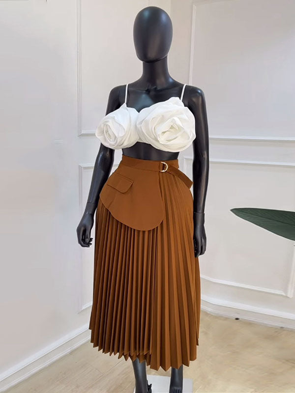 Jupe asymétrique plissée coupe trapèze, taille haute, à empiècements, couleur unie