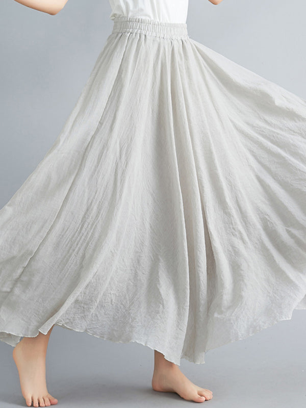 Jupe ample plissée coupe trapèze, à taille élastique, couleur unie