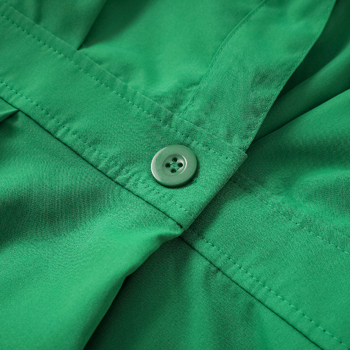 Robe mi-longue sans manches, à col revers, couleur unie