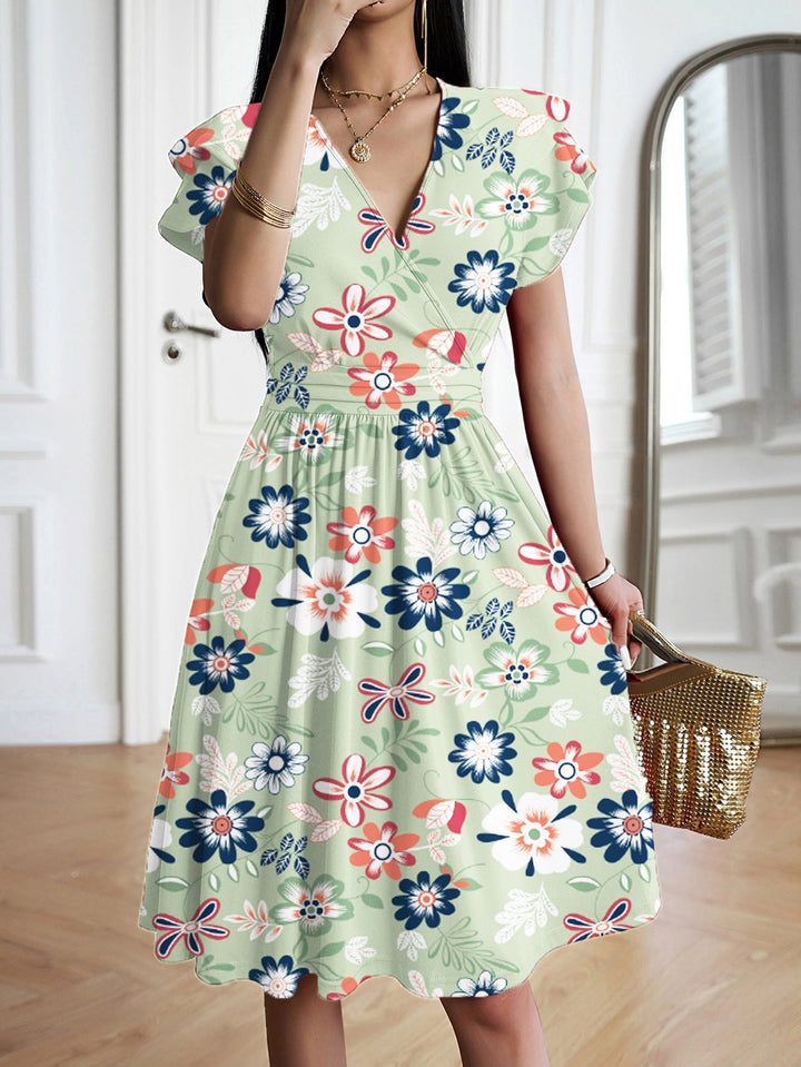 Noelia - Robe midi à fleurs avec manches volantées