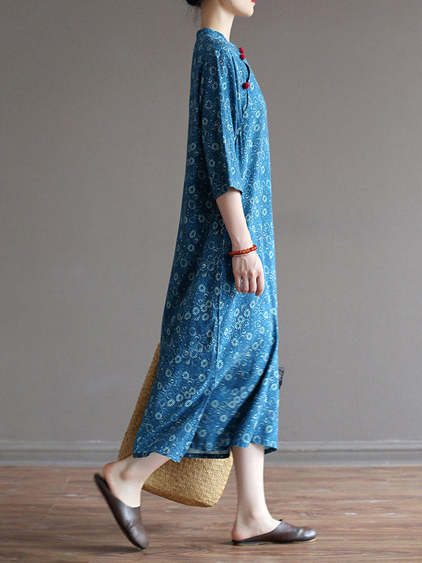 Robe mi-longue originale à col montant et motif floral uni