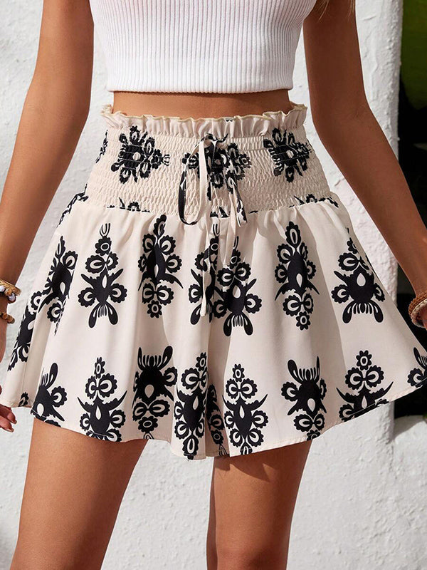 Short imprimé à jambes larges, à cordon de serrage, à taille élastique, à empiècements