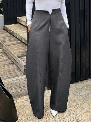 Pantalon ample à poches, à fermeture éclair, couleur unie