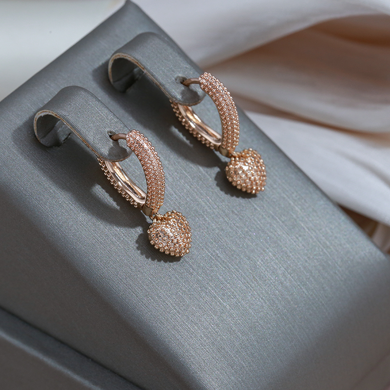 Boucles d'oreilles en cœur doré élégantes