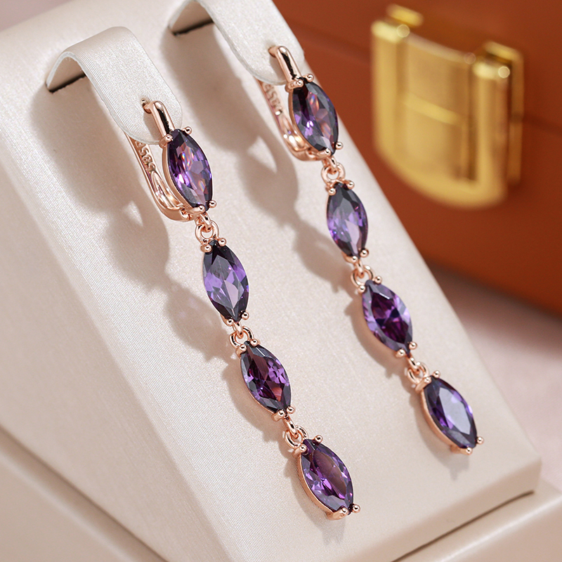 Boucles d'oreilles avec des cristaux violets