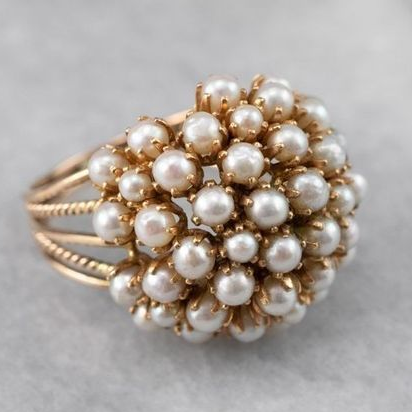 Bague en perles gravées