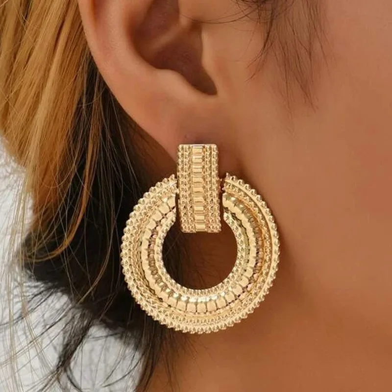 Boucles d'oreilles Mandala en or élégant