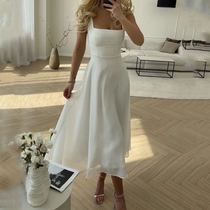 Kristina | Robe midi sans manches avec décolleté carré