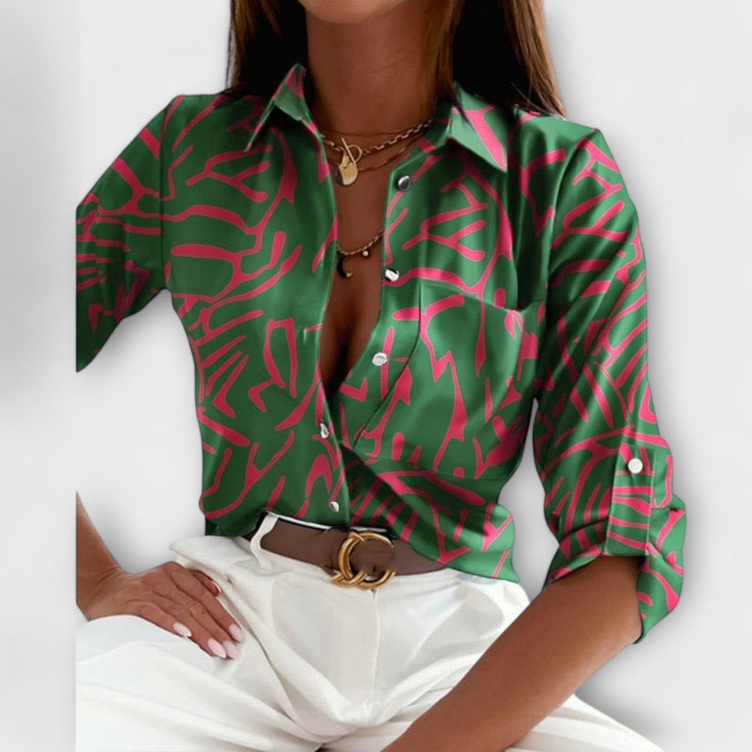 Lorena – Blouse avec imprimé graphique et flair rétro