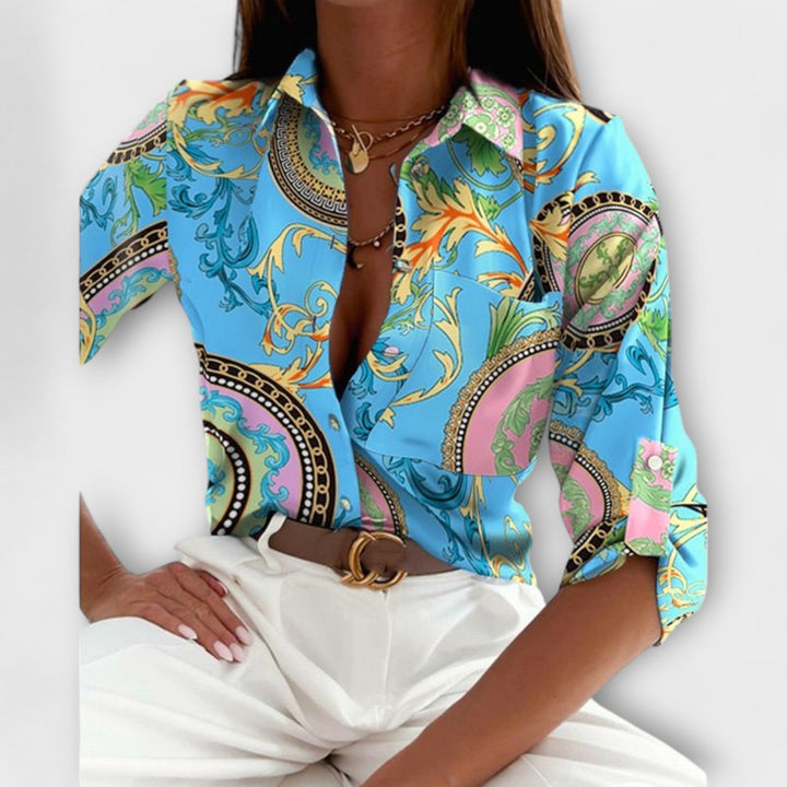 Lorena – Blouse avec imprimé graphique et flair rétro