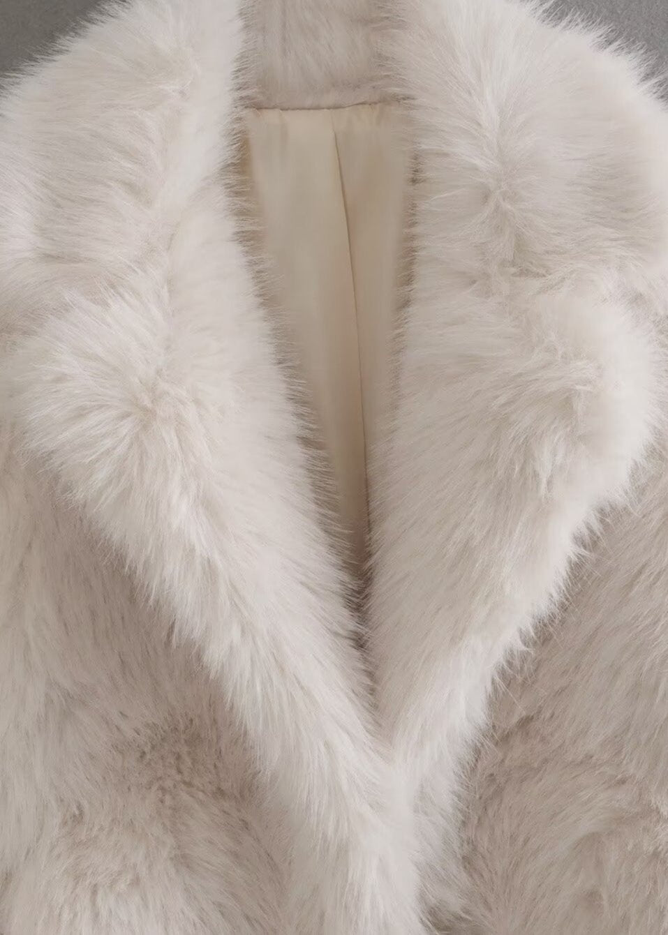 Manteau en peluche pour femmes avec col montant et fermeture à crochets